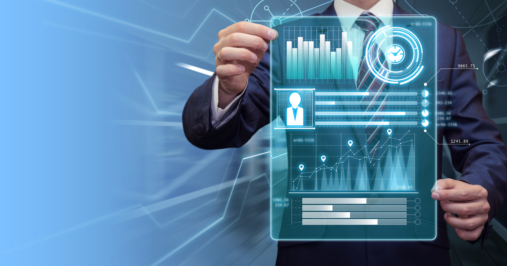 A person holding a digital overlay displaying graphs, data, and demographic information.